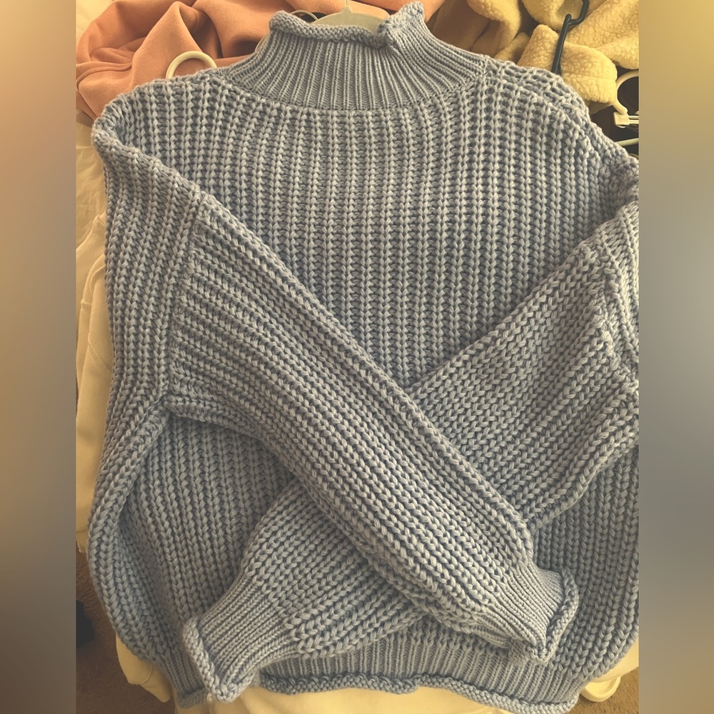 Blue knitted sweater